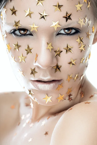 Mujer con estrellas en la cara —  Fotos de Stock