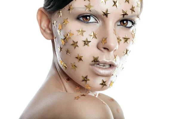 Mujer con estrellas en la cara — Foto de Stock