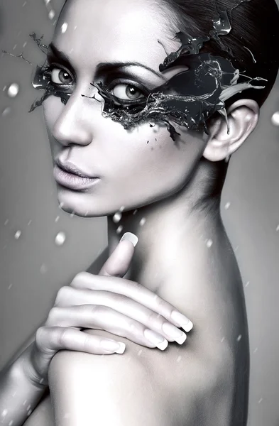 Winter woman with splash mask — Stock Photo, Image