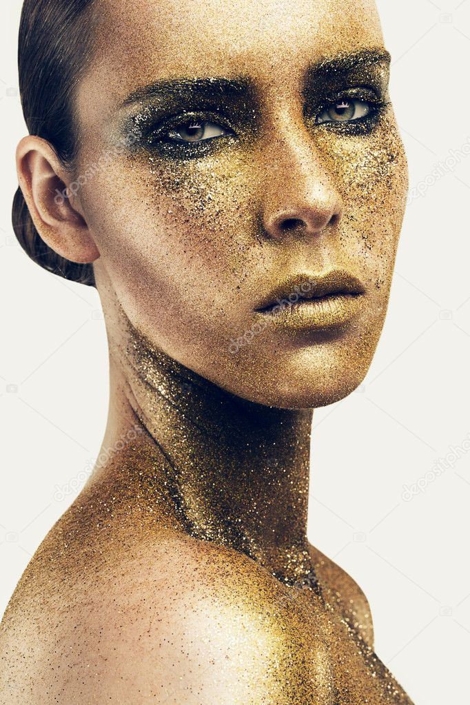 Woman in gold glitters