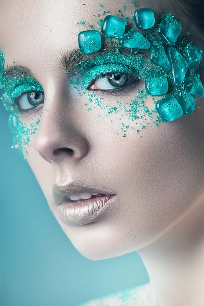 Woman with turquoise stones — Stock Photo, Image