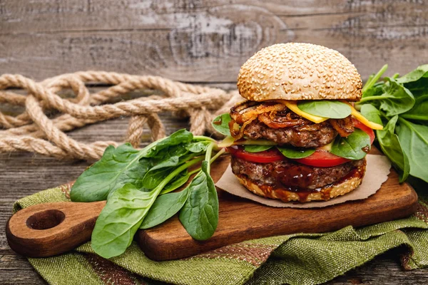 Hamburger with spices and herbs — Stock Photo, Image