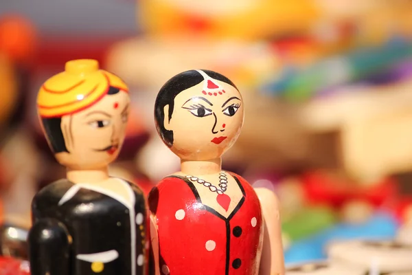 Closeup of clay dolls in indian attire, selective focus — Stock Photo, Image