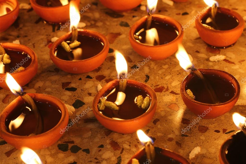 Oil Lamp During Prayer Stock Photo Motionkarma 56376539 Oil Lamp During Prayer Stock Photo