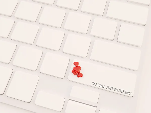 Chiave del computer etichettata social networking con cuori — Foto Stock