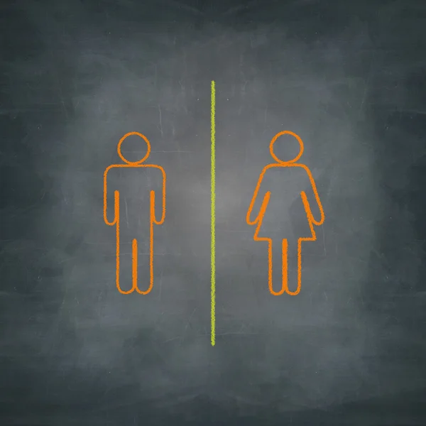 Separate man and woman with chalk on blackboard — Stock Photo, Image