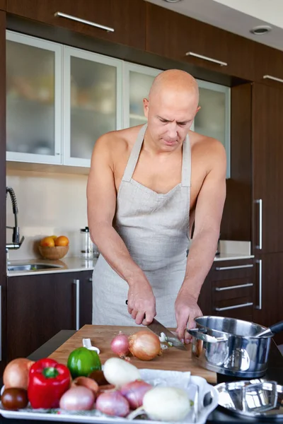 Man at home is cooking. — Stock Photo, Image