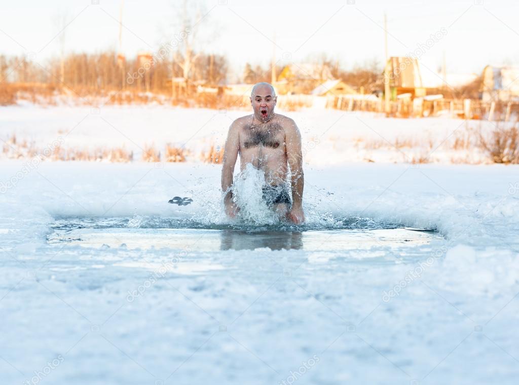 winter recreation - swimming in  ice-hole