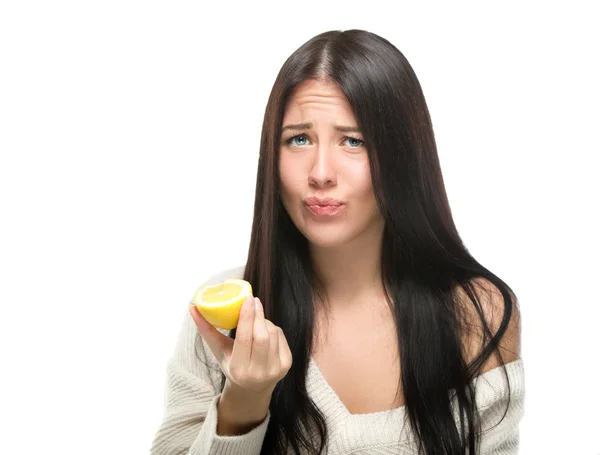 Beautiful close-up portrait of young woman with lemons.