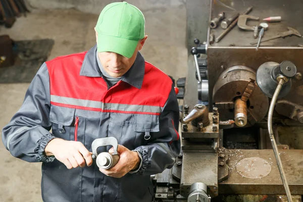 Turner works for lathe — Stock Photo, Image