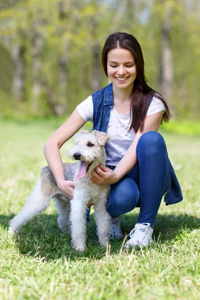 Portrait of Beautiful young girl with her dogs — Stock Photo, Image