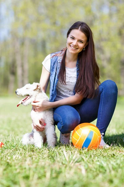 Portrait of Beautiful young girl with her dogs — Stock Photo, Image