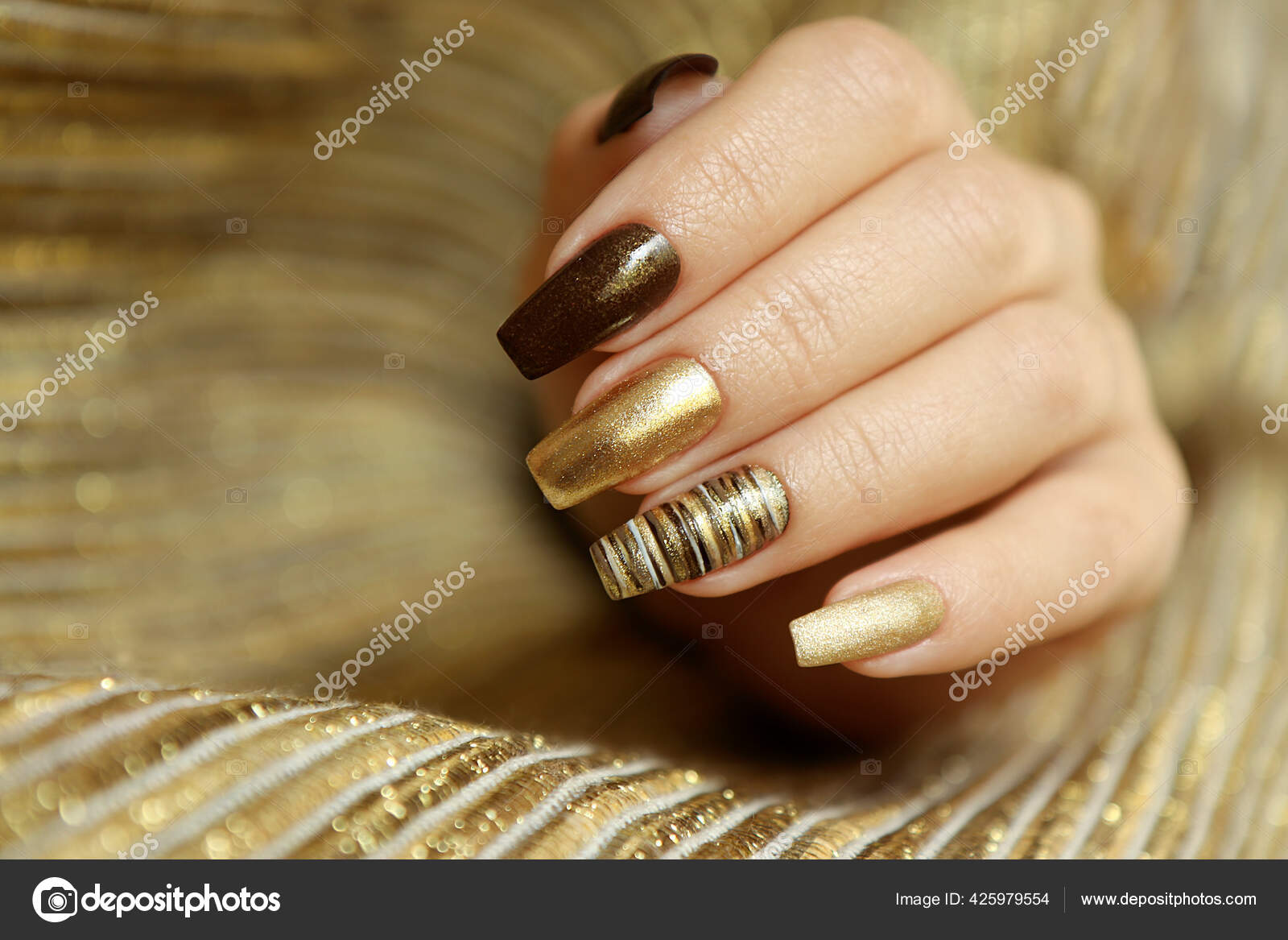 Fashionable Manicure Matte Golden Color Nail Polish Brown Long Nail Stock  Photo by ©marigo 425979554