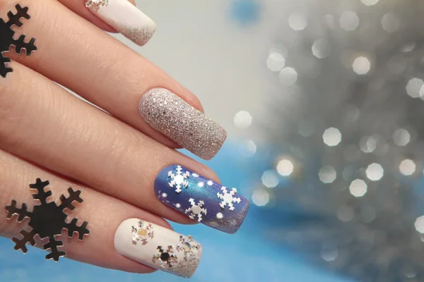 Manicure with snowflakes. — Stock Photo, Image