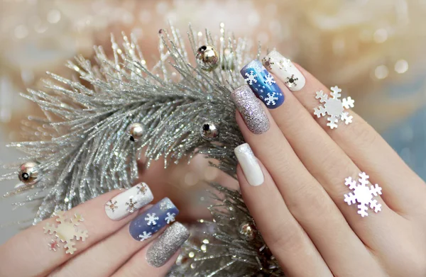 Manicure with snowflakes. — Stock Photo, Image