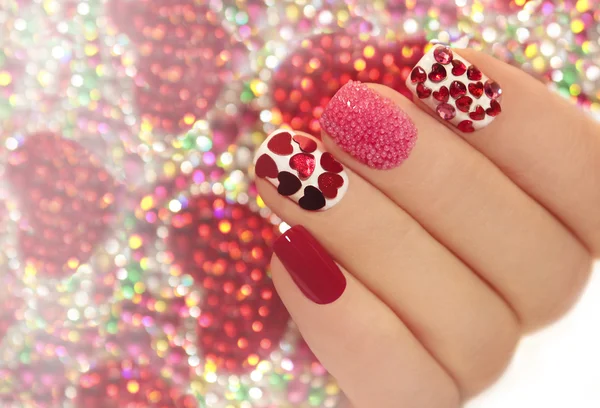 Manicure with hearts. — Stock Photo, Image