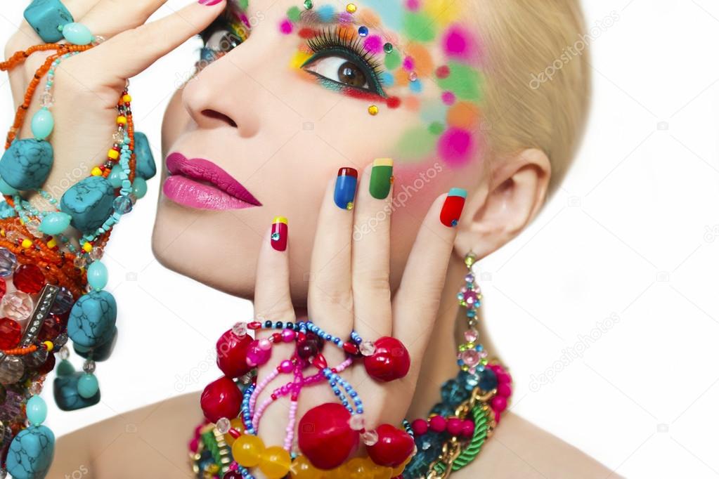 Colorful makeup and manicure.