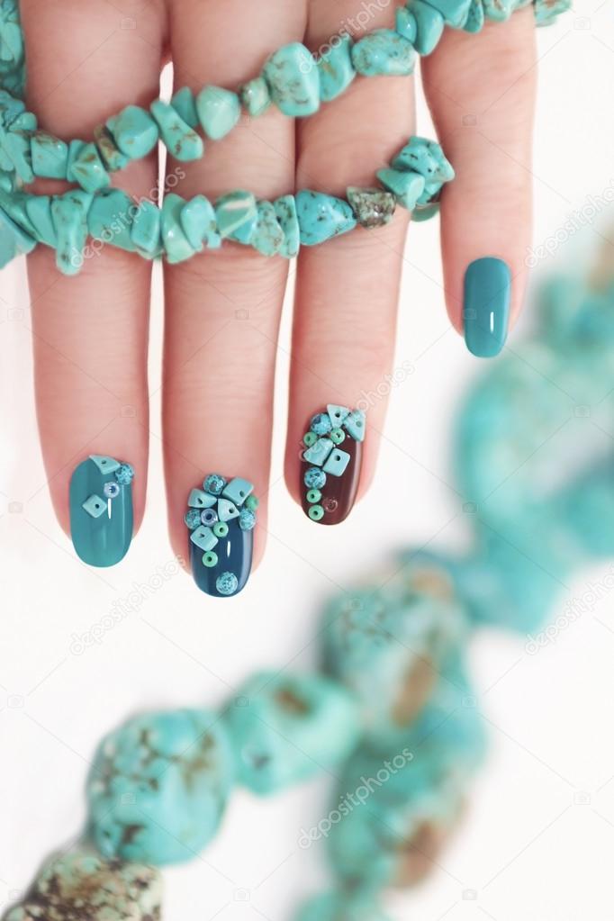 Turquoise Nail Art Female Manicure On A Light Wooden Background Long  Almondshaped Nailsrussia High-Res Stock Photo - Getty Images