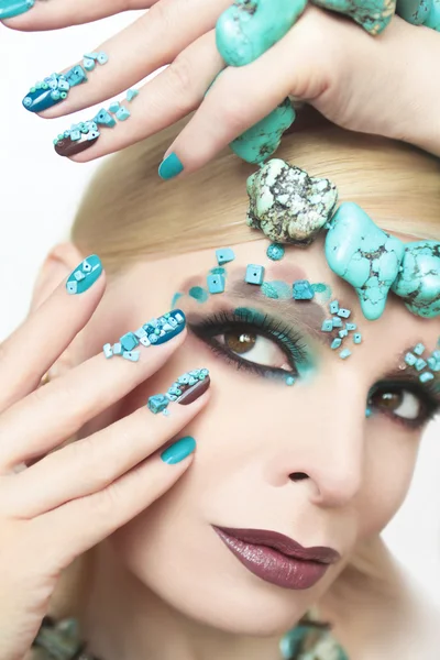 Manicure with stones of turquoise. — Stock Photo, Image