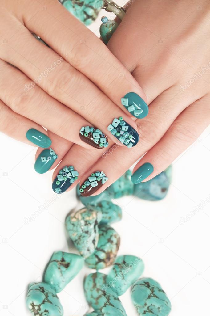 Manicure with beads and turquoise