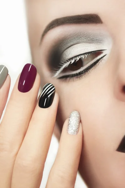 Makeup and manicure in gray. — Stock Photo, Image