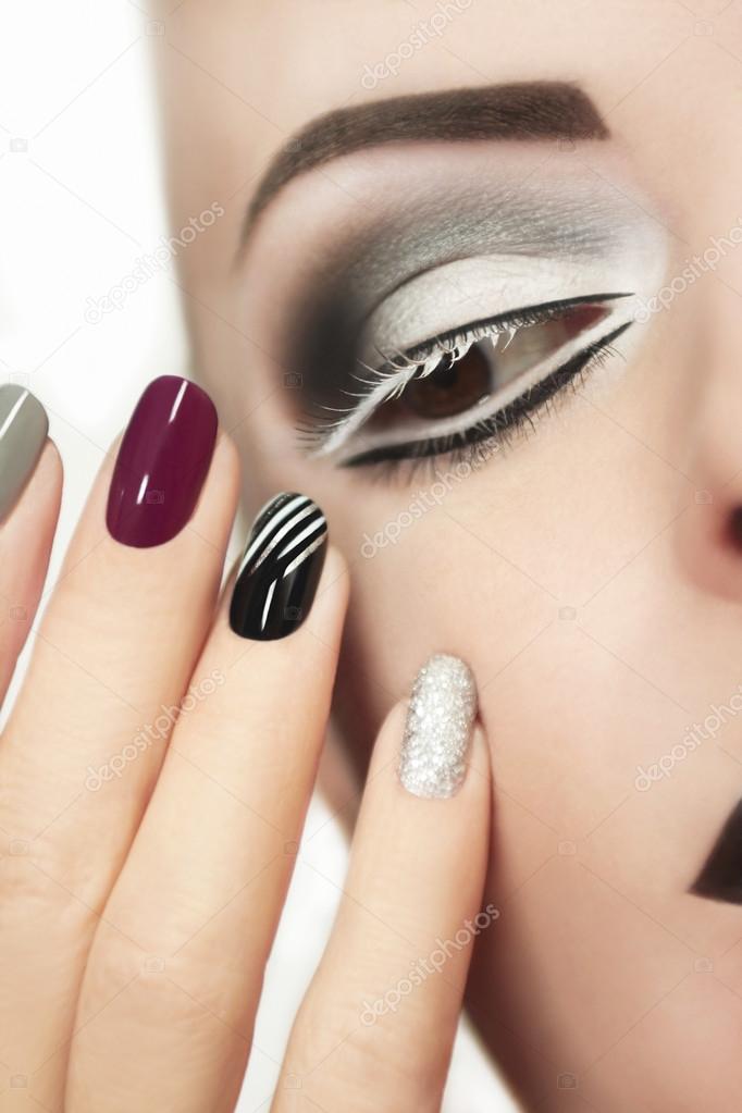 Makeup and manicure in gray.