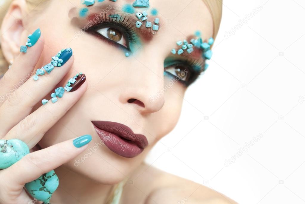 Manicure and makeup with turquoise stones