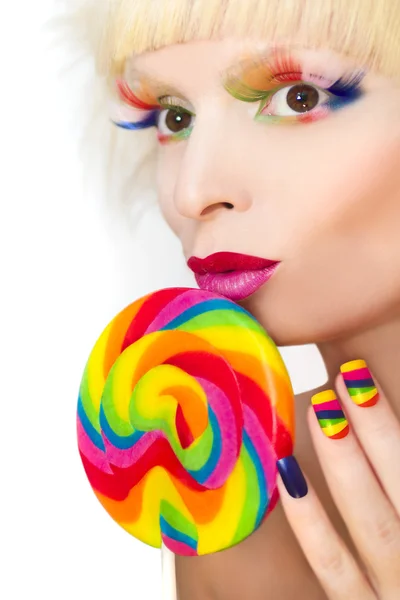 Manicura arco iris en uñas artificiales . Imagen De Stock