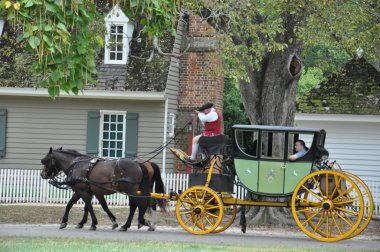 Horse-drawn carriage rides in Williamsburg, Virginia clipart