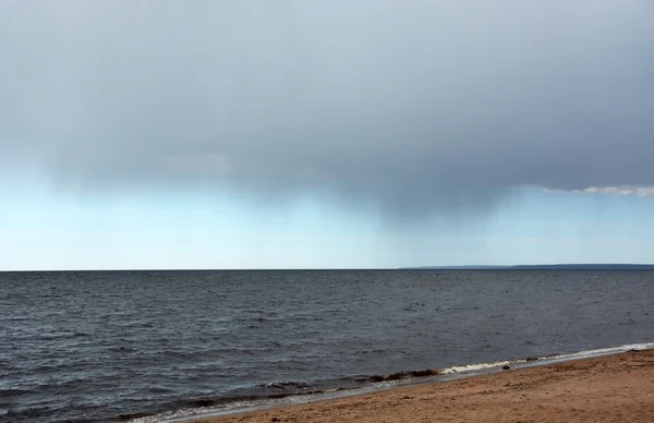 Big rainy clouds over the sea — Stock Photo, Image