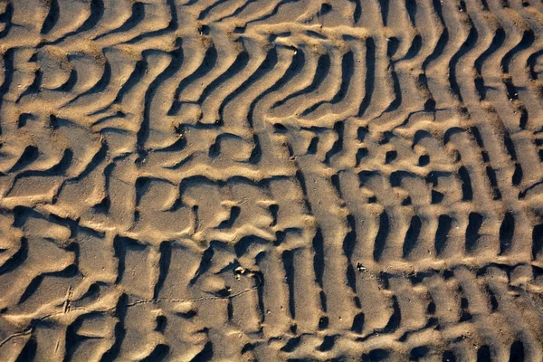 Interessante modello di sabbia sulla spiaggia — Foto Stock
