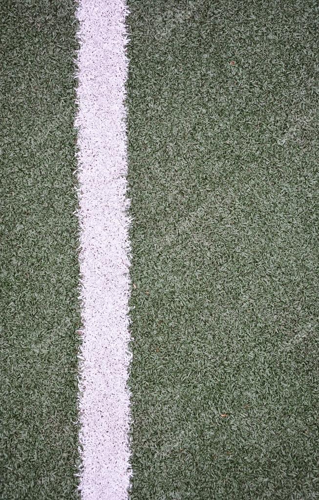 firm ground on artificial grass