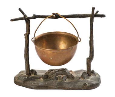 kettle hanging over the fire metal figurine