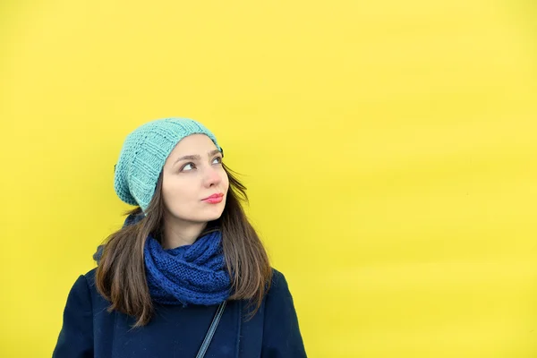 Girl on a yellow background — Stock Photo, Image