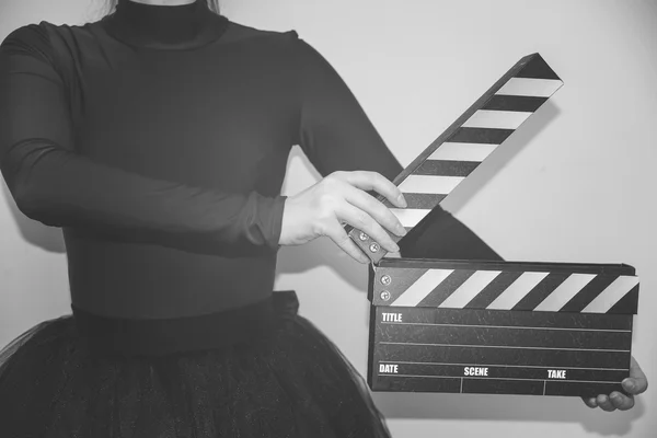 Clapboard in hand — Stock Photo, Image
