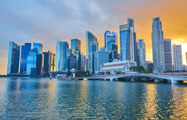 View of the central district of Singapore with modern skyscrapers at sunset