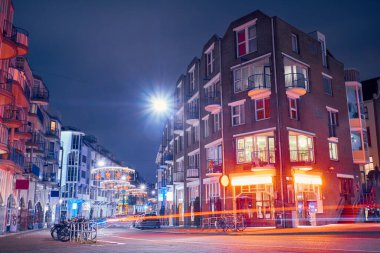 Beautiful street with shops and coffeeshops in Amsterdam at night