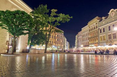 Cityscape in Krakow. View of the street in the city center at night.