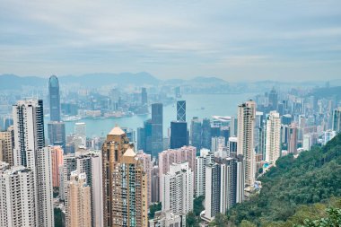 Cityscape. View of skyscrapers and Victoria Harbor from Victoria Peak in Hong Kong