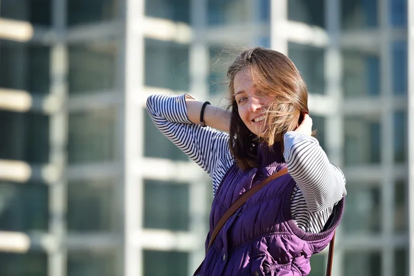 Girl in a a sleeveless jacket — Stock Photo, Image