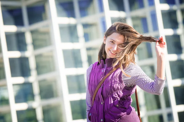 Girl in a sleeveless jacket — Stock Photo, Image