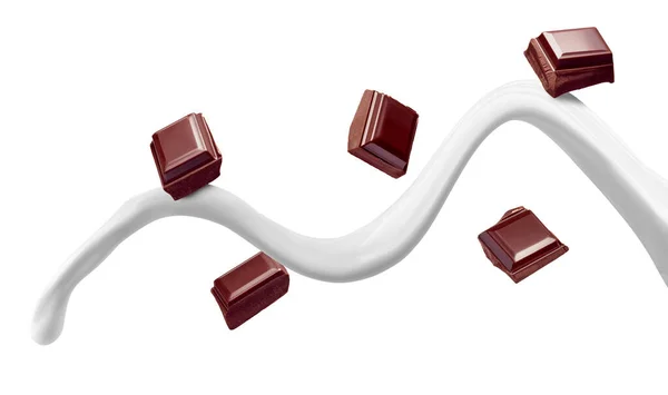 Nahaufnahme Von Schokoladenstücken Und Milch Auf Weißem Hintergrund — Stockfoto