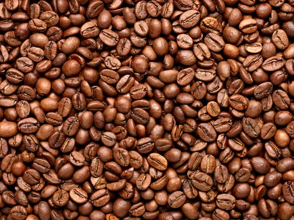 Närbild Kaffebönor Bildar Bakgrund — Stockfoto