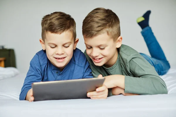 School Age Brothers Friends Having Fun Tablet Together Hom — Stock Photo, Image