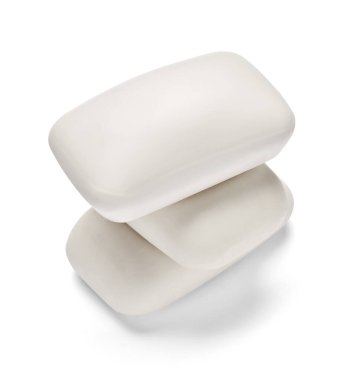 Beyaz arkaplanda beyaz bir sabun çubuğunu kapat