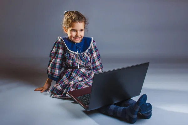 Girl child teenager European appearance brunette looking at a co — Stock Photo, Image