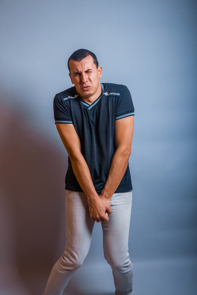 years old man of European appearance wants to use toilet