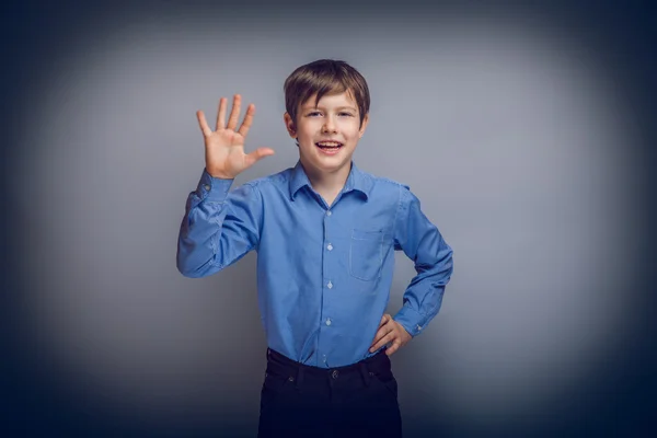 Teenager boy brown hair of European appearance waving experienci — Stock Photo, Image