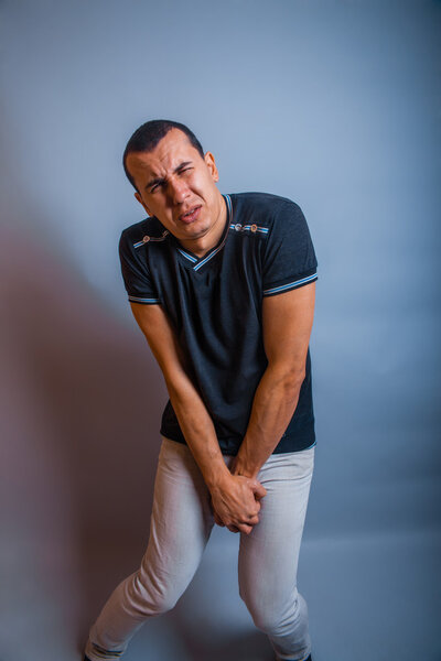 the man European appearance brunet pressed his hands