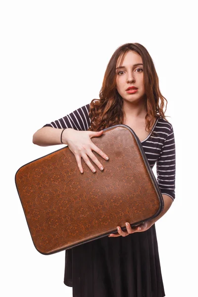 Woman with suitcase in hand isolated on white background — Stock Photo, Image